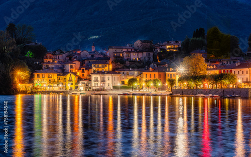 The beautiful village of Mergozzo, illuminated in the evening. Piedmont region, northern Italy.
