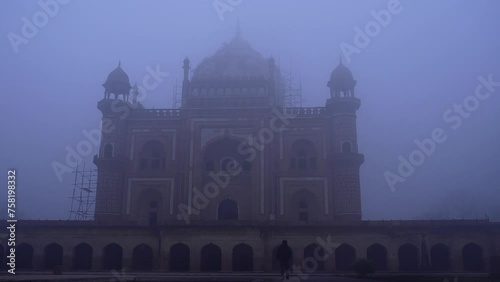 16 Jan 2024- Safdarjung Tomb Veiled in Fog during Early Winter Morning in Delhi. photo
