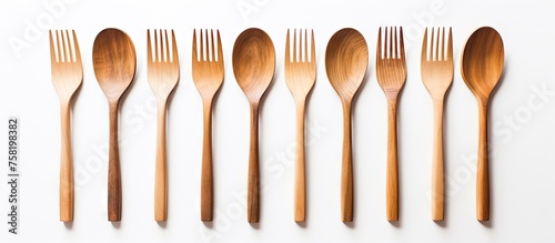 Collection of Rustic Wooden Forks on a Clean White Background for Kitchen Decor and Dining