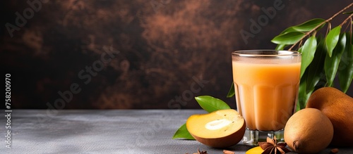 Freshly Squeezed Orange Juice Surrounded by Ripe Oranges and Citrus Fruits