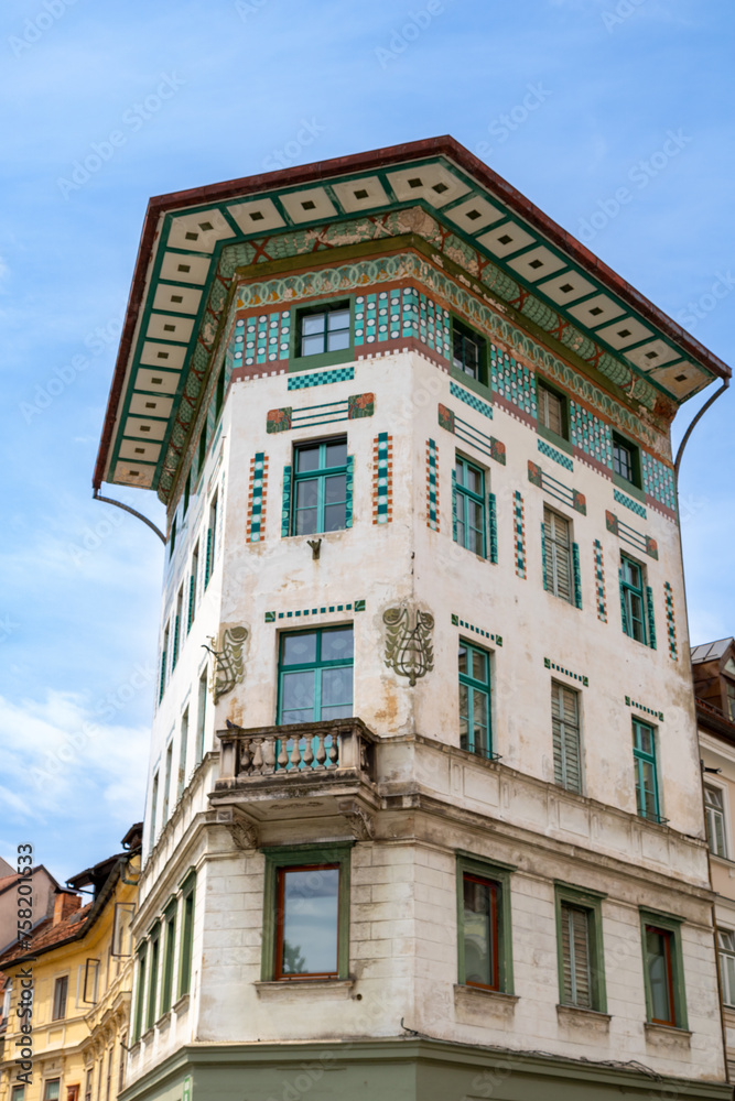 Obraz premium Hauptmann House, beautiful building located in Prešeren square (Prešernov trg) in front of Franciscan Church of the Annunciation Ljubljana, Slovenia. 