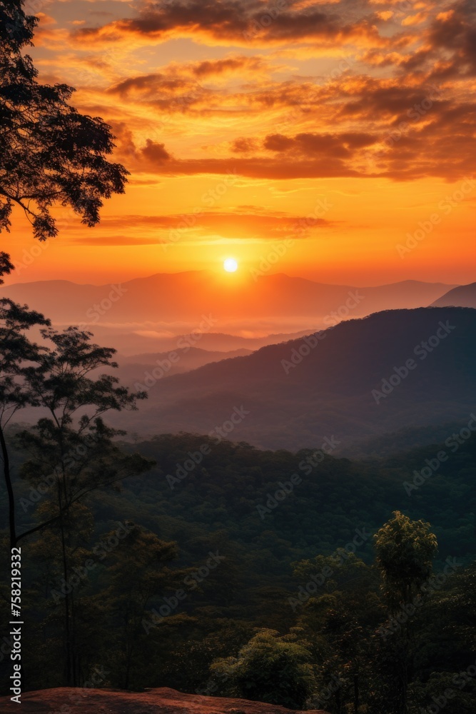 A scenic view of the sun setting behind mountains, perfect for nature backgrounds
