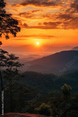 A scenic view of the sun setting behind mountains, perfect for nature backgrounds
