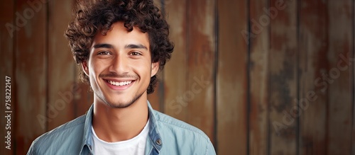 Cheerful Man with Curly Hai...