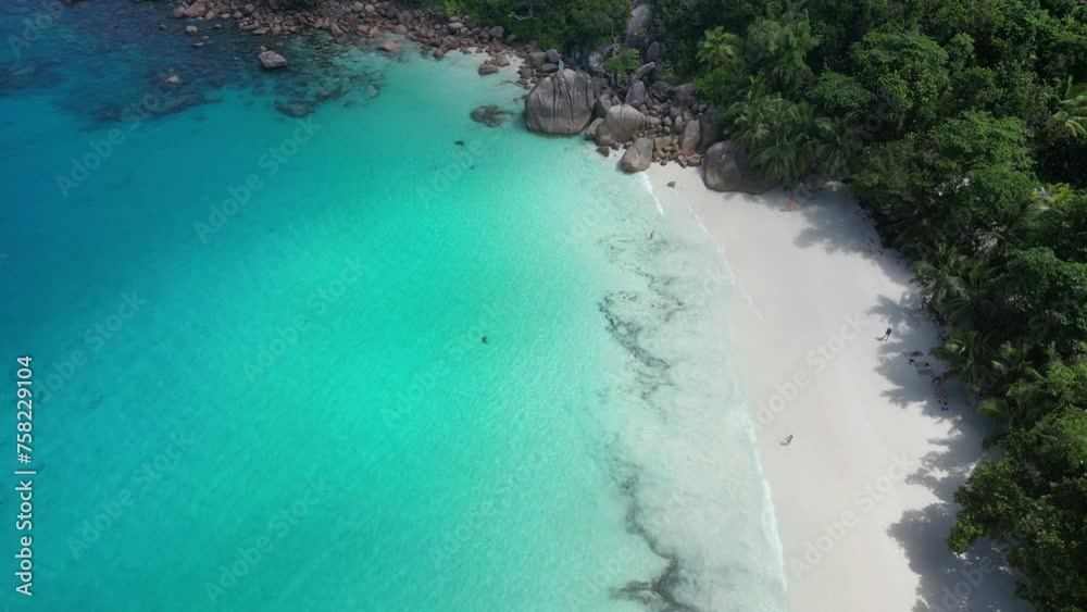 Anse Cocs beach, La Digue Seychelles, tropical beach during a luxury vacation in Seychelles. Tropical beach Anse Cocs beach, La Digue, Praslin, Mahe Seychelles with turqouse colored ocean Anse Cocs beach, La Digue Seychelles, tropical beach during a luxury vacation in Seychelles. Tropical beach Anse Cocs beach, La Digue, Praslin, Mahe Seychelles with turqouse colored ocean