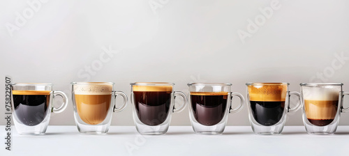 Set with different cups of hot aromatic espresso coffee Isolated on grey background