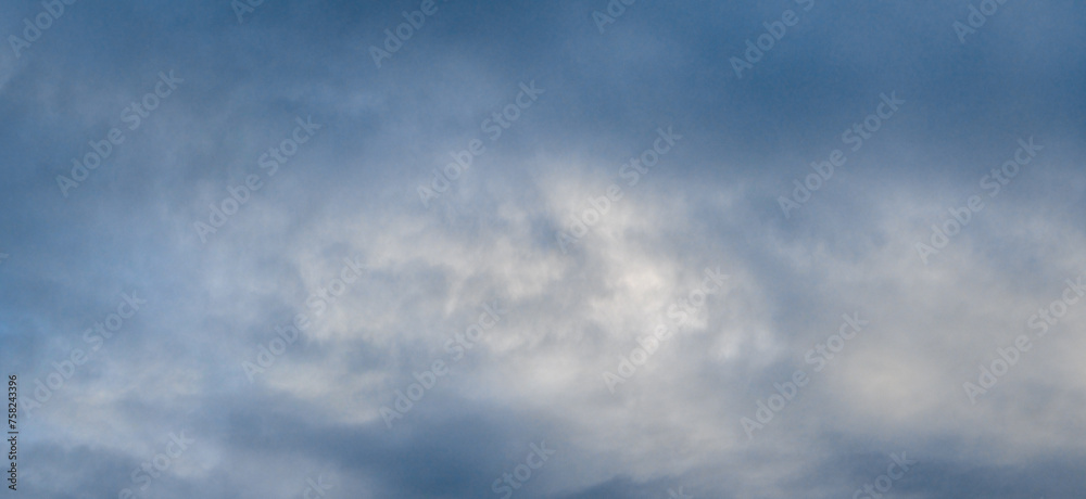 Blue sky with dark blue clouds in the morning or evening
