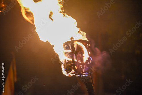 Flames of a coppara torch that lighting in Kandy Esala Perahera at Temple of the Tooth (Sri Dalada Maligawa), Kandy, Sri Lanka.