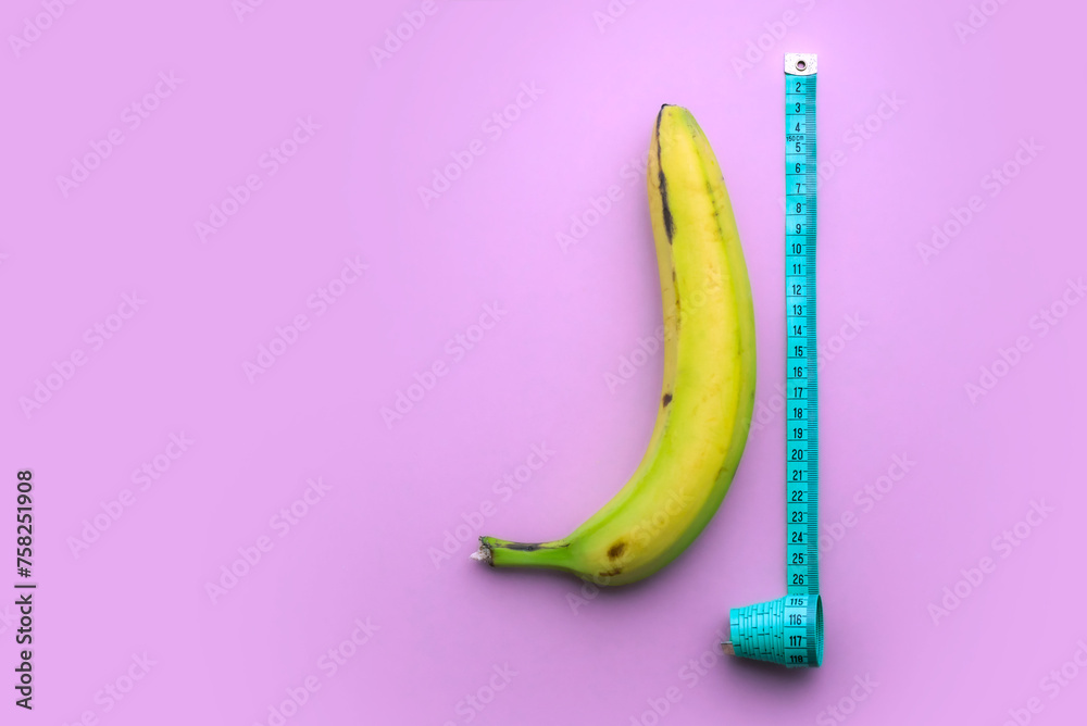 Banana with measuring tape on pink background. Men penis size concept. Flat lay, top view, copy space. - obrazy, fototapety, plakaty 