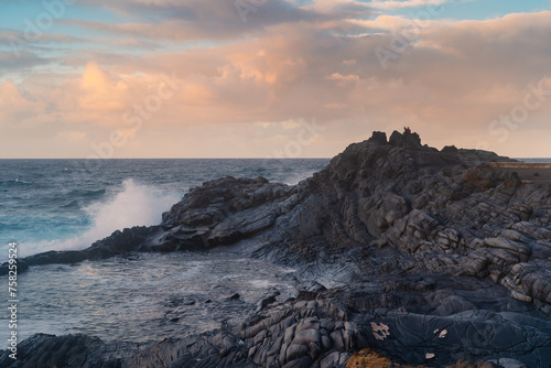 waves beating against the rocks in El Puertillo at sunset. Arucas. Gran Canaria. Canary islands