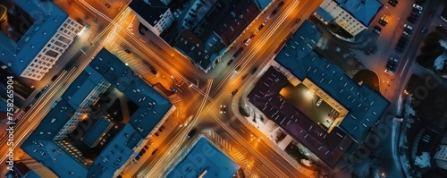 top view of city streets and buildings at night