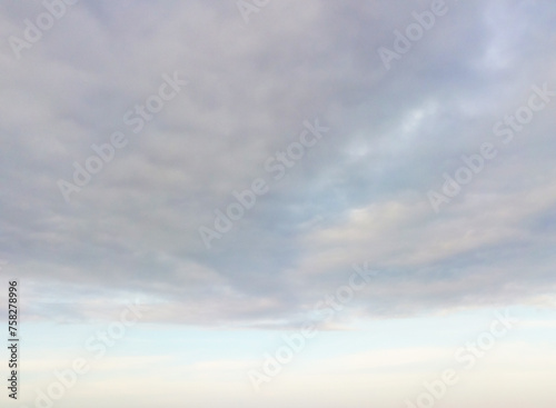 Canvas Print hanging gray clouds on blue sky texture background wallpaper