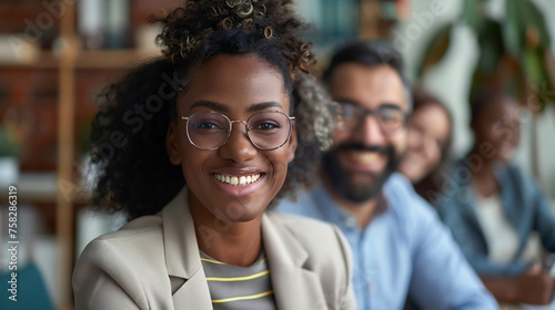 Smiling diverse colleagues gather in boardroom brainstorm discuss financial statistics together.