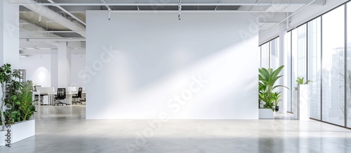 Large white wall mockup in an office building.