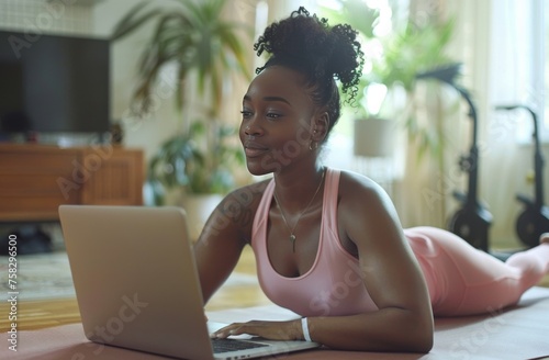 Woman Laying on Floor Using Laptop
