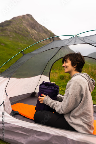 Scottish Sanctuary: Woman in Her Tent, Breathing the Earthy Scent of Moss and Adventure