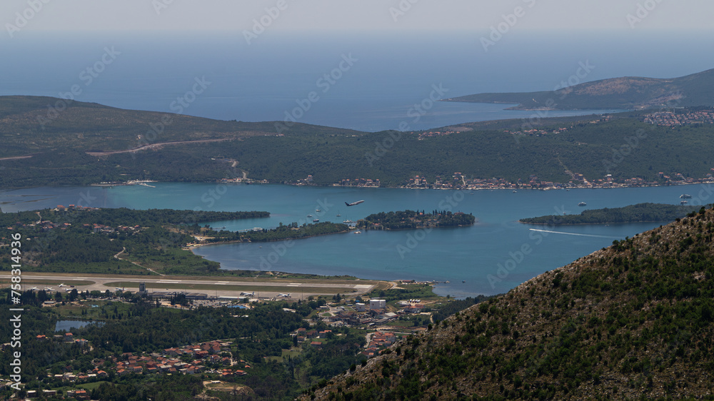 breathtaking view of an airplane in a coastal area Montenegro / Tivat