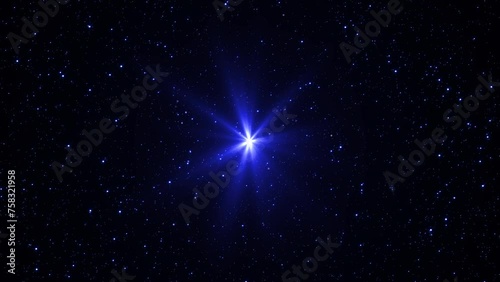 Cinematic cosmic background of blue glowing strars in the space. Cosmos, Universe, space travel concept. Shiny star surrounded by cosmic dust. Supernova, Nebula, Sirius, and stardust animation. photo