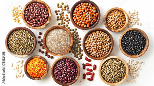 Top view of various beans, legumes and grains on a white background with copy space for healthy eating or grocery shopping concepts