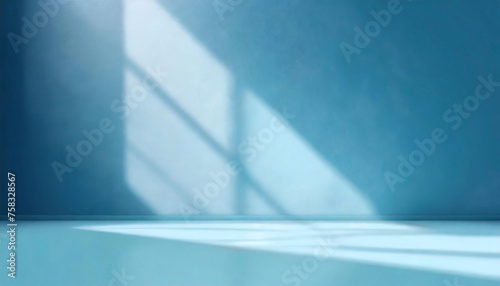 abstract minimal light grunge blue background for product presentation. Shadow and light from windows on plaster wall.