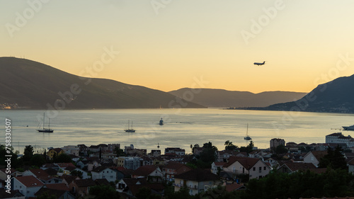 breathtaking view of a coastal area with a plane in Montenegro / Tivat