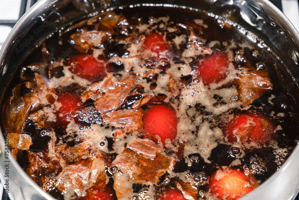 the-eggs-boiled-in-pot-with-onion-peels-for-coloring-preparation-for