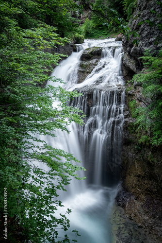 Long exposure color shot of a forest waterfall