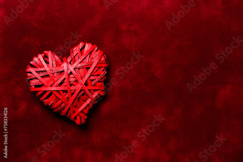 red love heart on felt texture with copy space