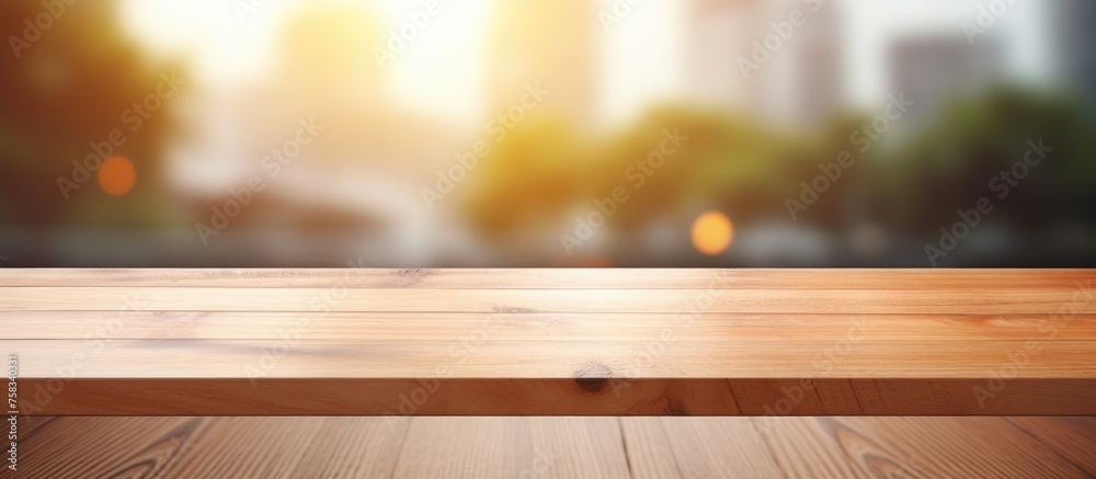 Empty wooden desk for product presentation on blurred background - obrazy, fototapety, plakaty 