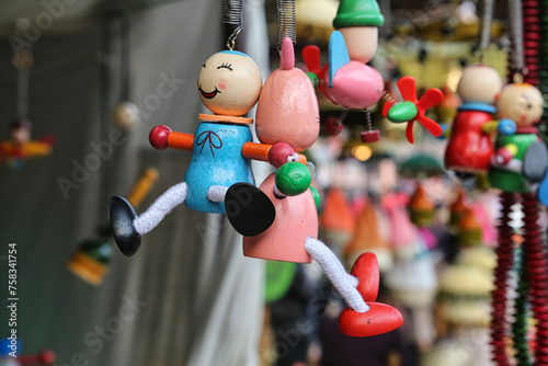 Canvas Print Colored wooden dolls displayed at a Indian handicrafts fair at New Delhi
