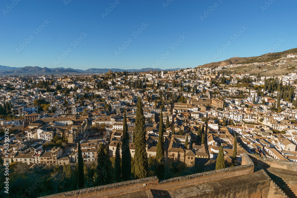 Landscape photo of the white houses moorish Albaicin district seen from the Alhambra, Granada, Andalusia, Spain