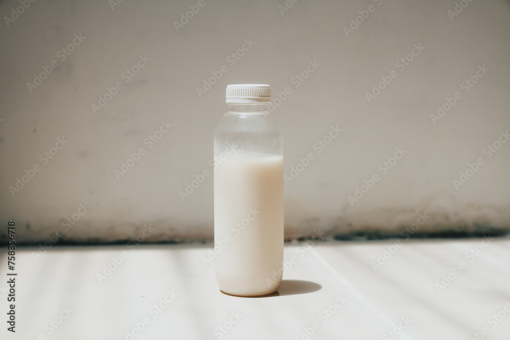 isolated white milk in the bottle with white background isolated white milk in the bottle with white background