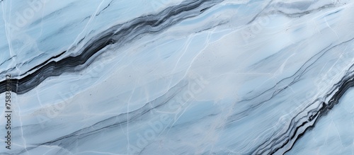 Wallpaper Mural A detailed shot of a frozen slope resembling a blue and white marble pattern created by wind waves in an icy landscape, with hints of electric blue in the ice cap Torontodigital.ca