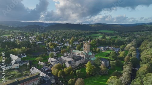 Buckfast Abbey from  a drone at evening sun, Totnes, Devon, England, Europe photo