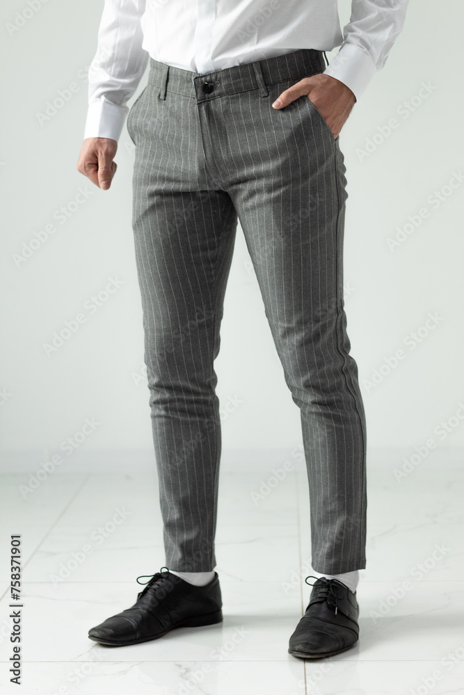 Bulgaria - 03 19 2024: Grey thight male pants for every occasion. Bulgaria - 03 19 2024: Grey thight male pants for every occasion.