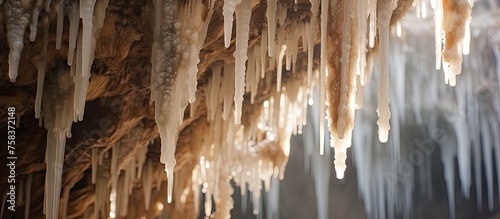 Soda straws, stalagmites, and stalactites are formations made of speleothems, a natural material found in caves. The icicles hanging from the ceiling are a result of a freezing event photo
