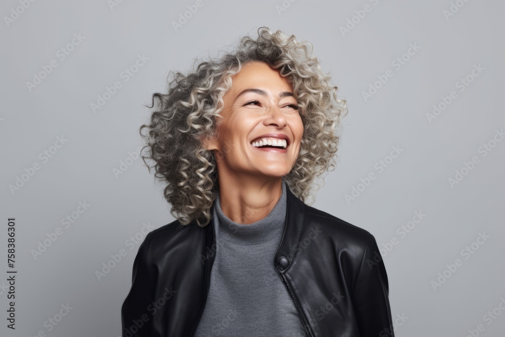 Portrait of a smiling african american woman with curly hair. Portrait of a smiling african american woman with curly hair.