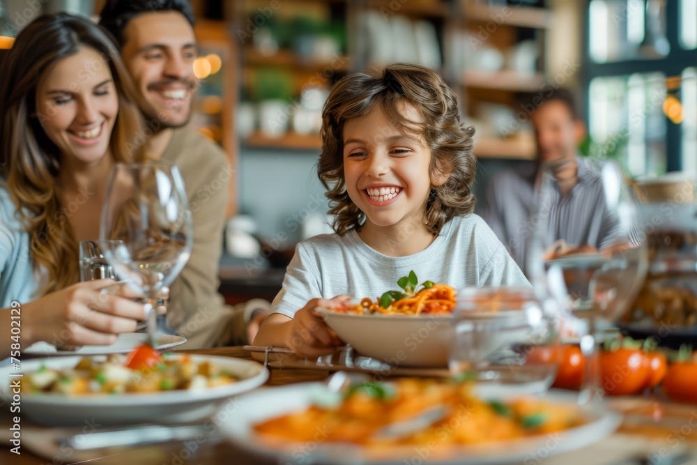 Happy Family Enjoying Delicious Pasta Meal Together in Cozy Restaurant Setting