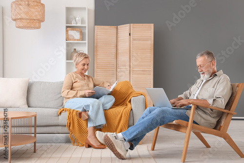 Mature couple resting at home