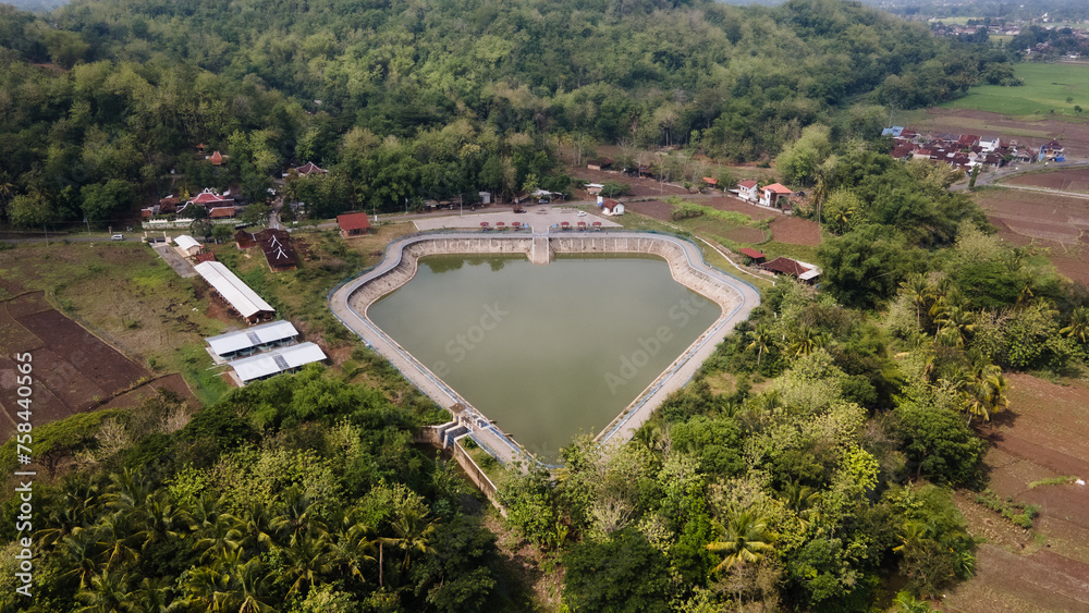 Aerial view of Imogiri 2 embung which has a shape like a Wayang mountain / kayonan, located in Bantul, Indonesia