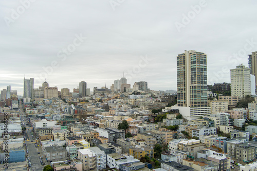 aerial shot of skyscrapers, hotels and office buildings in the city skyline, apartments, condos and cars on the street in San Francisco California USA