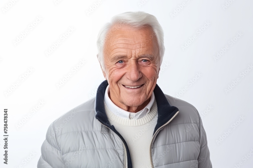 Portrait of a smiling senior man looking at camera on white background Portrait of a smiling senior man looking at camera on white background