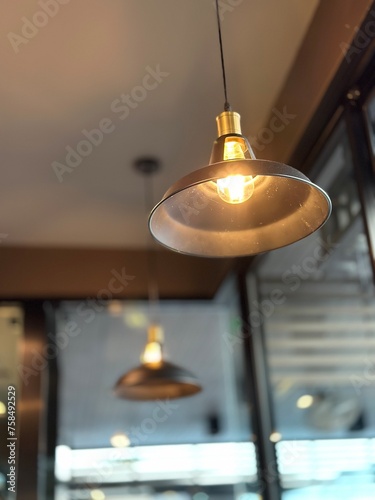 group of hanging lights with a shallow depth of field.	