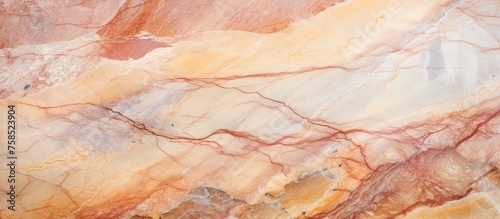 An artistic closeup of a marble texture resembling a painting with shades of brown, beige, peach, and woodlike patterns. A visual arts landscape in rock form