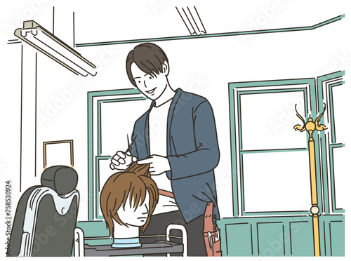 ヘアマネキンでヘアカット練習をする男性美容師