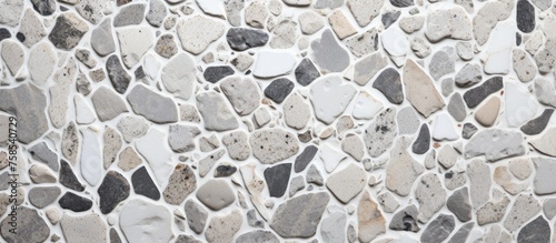 A detailed shot of a stone wall showcasing the natural material and intricate patterns created by the rocks. The building material highlights the beauty of earth science