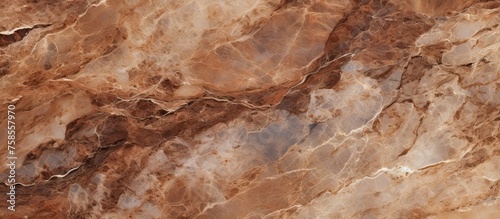 A detailed closeup of a brown marble texture with hints of beige and peach tones resembling natural material like wood or bedrock  creating a unique pattern perfect for flooring