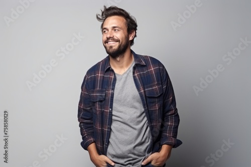 young casual man portrait, studio shot, gray background, studio shot