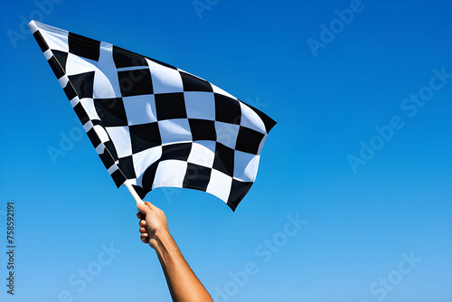 checkered race flag in hand. © Nyetock