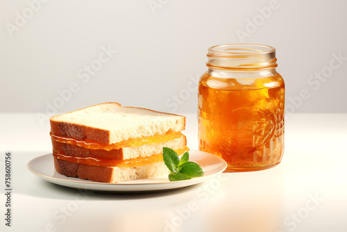 Photo of a delicious sandwich with orange marmalade isolated on a white background